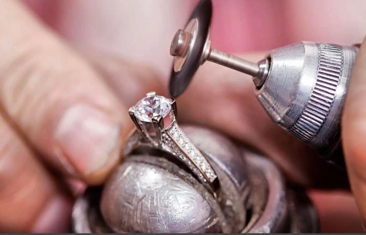 Expert jeweler at the workbench at Rainbow Jewelers